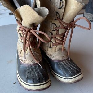 Sorel Tan and Black Winter Boots